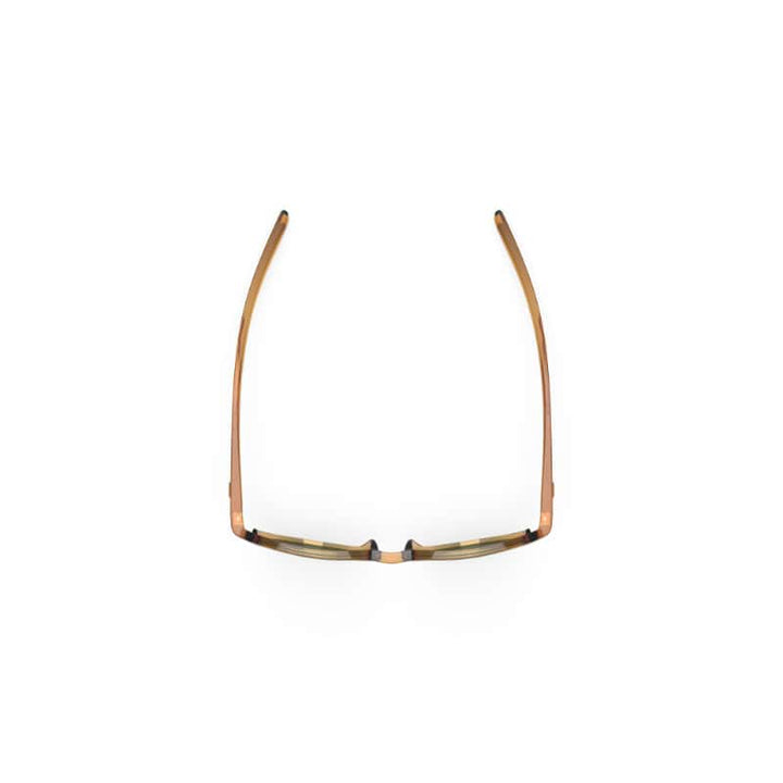 Lentes deportivas de ciclismo con marco dorado y lentes transparentes para una visión clara y protección en rutas y competencias. Ideal para amantes del ciclismo.